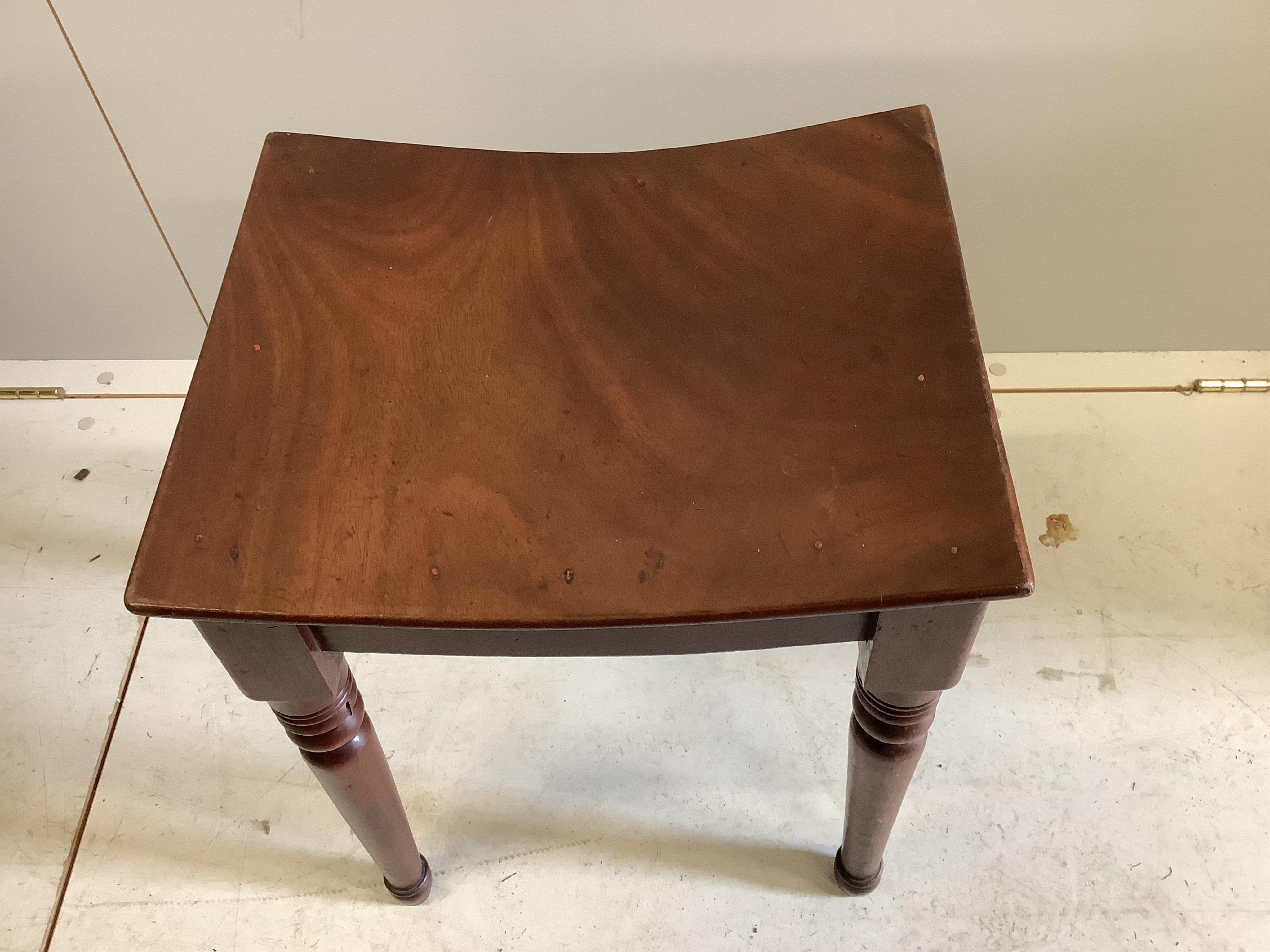 A Regency mahogany stool with curved seat, stamped Gillows, width 36cm, depth 36cm, height 48cm